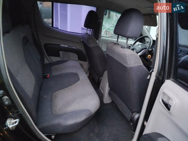 Чорний Міцубісі Л 200, об'ємом двигуна 2.48 л та пробігом 219 тис. км за 10500 $, фото 15 на Automoto.ua