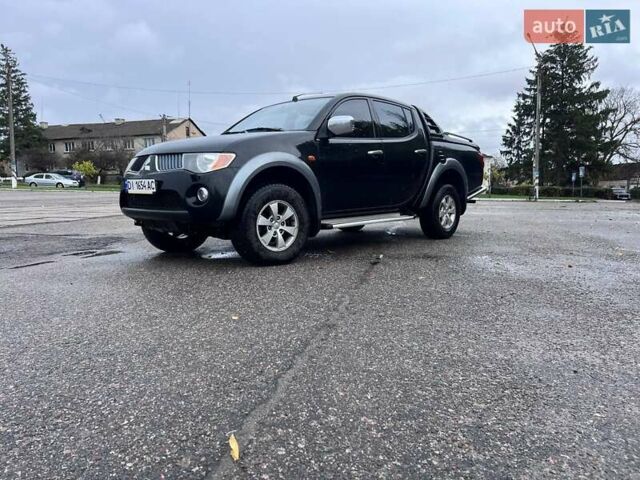 Чорний Міцубісі Л 200, об'ємом двигуна 2.48 л та пробігом 302 тис. км за 12500 $, фото 4 на Automoto.ua