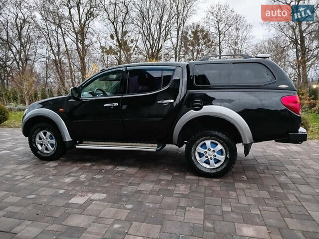 Чорний Міцубісі Л 200, об'ємом двигуна 2.48 л та пробігом 219 тис. км за 10500 $, фото 22 на Automoto.ua