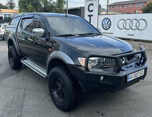 Черный Мицубиси Л 200, объемом двигателя 2.48 л и пробегом 210 тыс. км за 16500 $, фото 2 на Automoto.ua