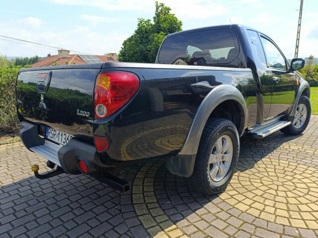 Черный Мицубиси Л 200, объемом двигателя 2.5 л и пробегом 230 тыс. км за 3150 $, фото 2 на Automoto.ua