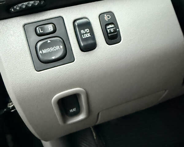 Черный Мицубиси Л 200, объемом двигателя 2.5 л и пробегом 261 тыс. км за 12300 $, фото 24 на Automoto.ua