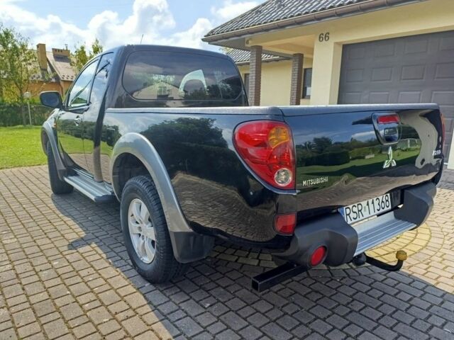 Черный Мицубиси Л 200, объемом двигателя 2.5 л и пробегом 230 тыс. км за 3150 $, фото 3 на Automoto.ua