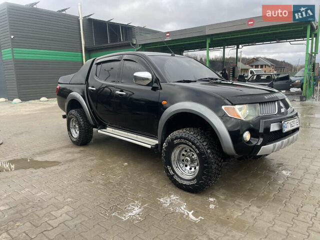 Черный Мицубиси Л 200, объемом двигателя 2.48 л и пробегом 370 тыс. км за 12750 $, фото 1 на Automoto.ua