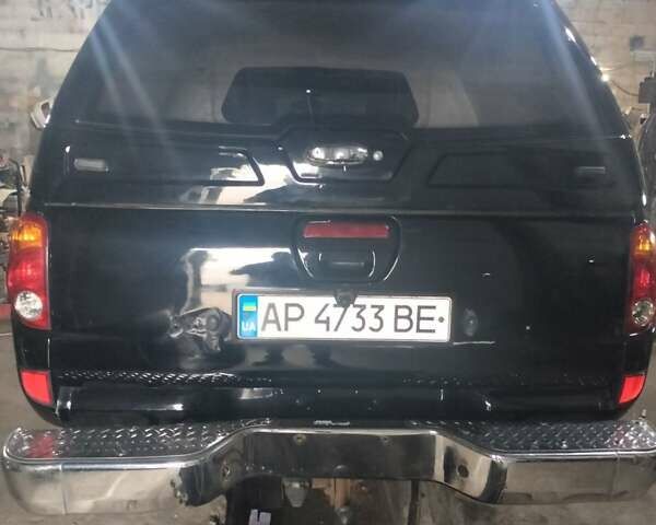 Чорний Міцубісі Л 200, об'ємом двигуна 2.5 л та пробігом 285 тис. км за 15000 $, фото 2 на Automoto.ua