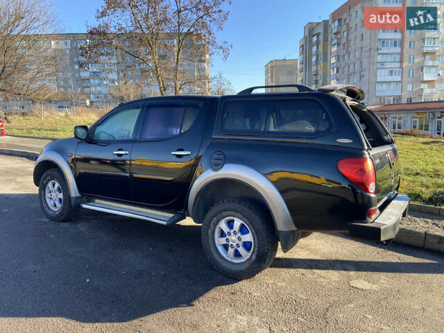 Чорний Міцубісі Л 200, об'ємом двигуна 2.48 л та пробігом 219 тис. км за 10500 $, фото 12 на Automoto.ua