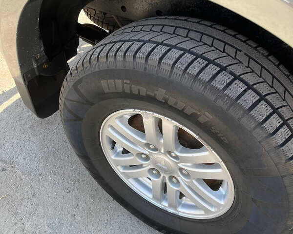 Черный Мицубиси Л 200, объемом двигателя 2.5 л и пробегом 221 тыс. км за 12800 $, фото 5 на Automoto.ua