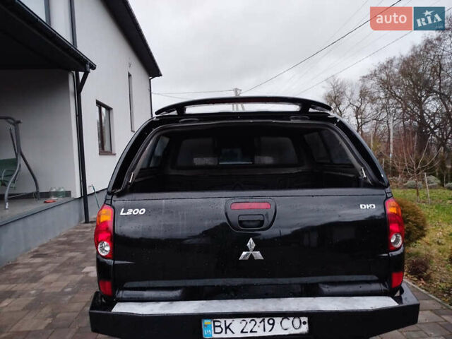 Чорний Міцубісі Л 200, об'ємом двигуна 2.48 л та пробігом 219 тис. км за 10500 $, фото 7 на Automoto.ua
