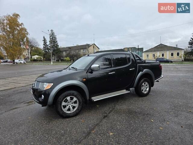 Чорний Міцубісі Л 200, об'ємом двигуна 2.48 л та пробігом 302 тис. км за 12500 $, фото 1 на Automoto.ua