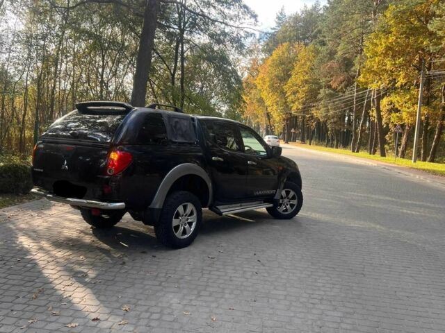 Черный Мицубиси Л 200, объемом двигателя 2.5 л и пробегом 180 тыс. км за 7200 $, фото 1 на Automoto.ua