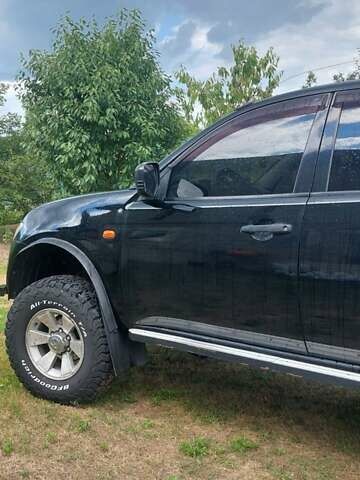 Черный Мицубиси Л 200, объемом двигателя 2.48 л и пробегом 392 тыс. км за 15500 $, фото 41 на Automoto.ua