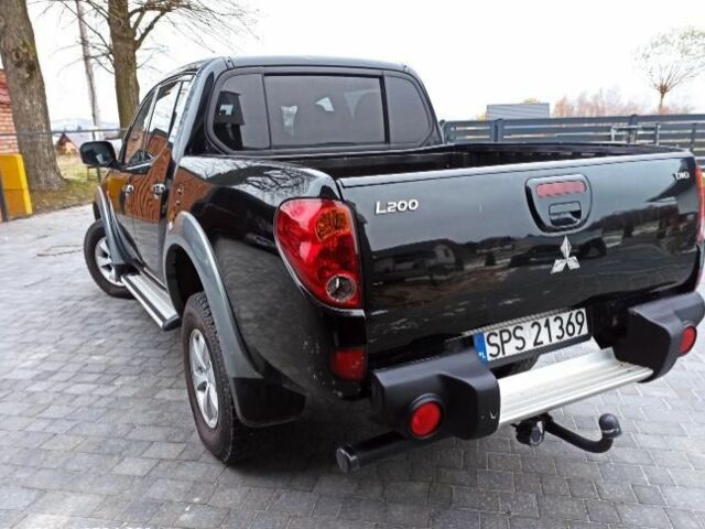 Черный Мицубиси Л 200, объемом двигателя 2.5 л и пробегом 270 тыс. км за 3424 $, фото 6 на Automoto.ua