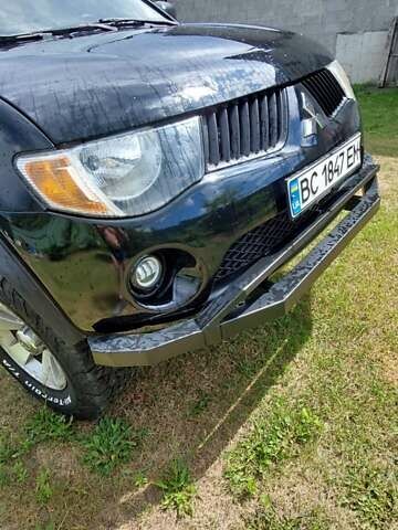 Черный Мицубиси Л 200, объемом двигателя 2.48 л и пробегом 392 тыс. км за 15500 $, фото 36 на Automoto.ua