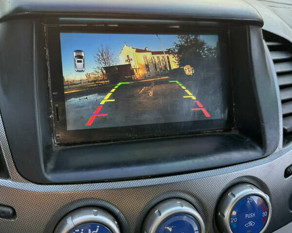 Чорний Міцубісі Л 200, об'ємом двигуна 2.5 л та пробігом 302 тис. км за 10500 $, фото 8 на Automoto.ua