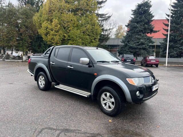 Чорний Міцубісі Л 200, об'ємом двигуна 2.5 л та пробігом 302 тис. км за 12500 $, фото 1 на Automoto.ua