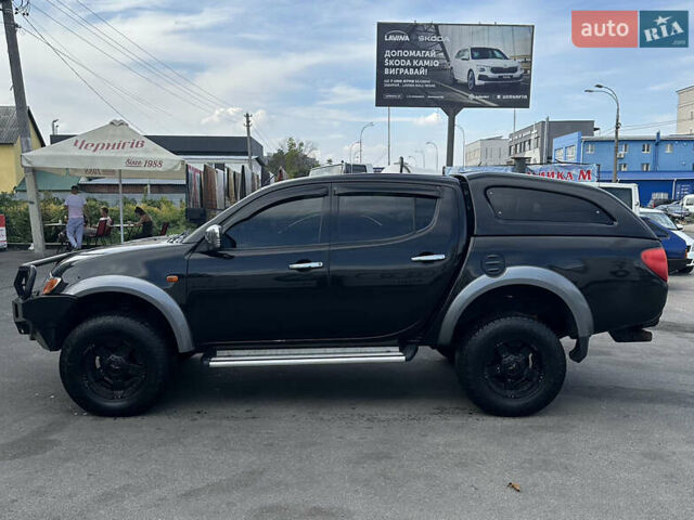 Черный Мицубиси Л 200, объемом двигателя 2.48 л и пробегом 210 тыс. км за 16500 $, фото 6 на Automoto.ua