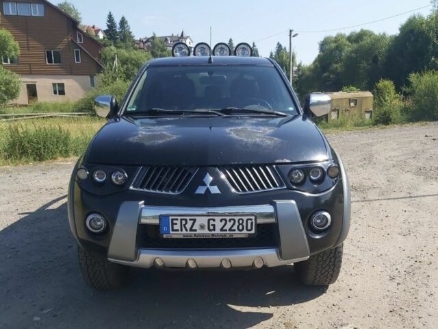 Чорний Міцубісі Л 200, об'ємом двигуна 2.5 л та пробігом 200 тис. км за 8756 $, фото 1 на Automoto.ua