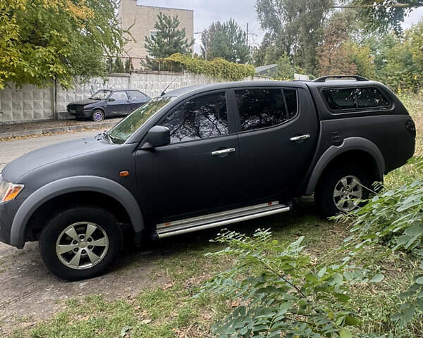 Чорний Міцубісі Л 200, об'ємом двигуна 2.48 л та пробігом 260 тис. км за 11500 $, фото 6 на Automoto.ua