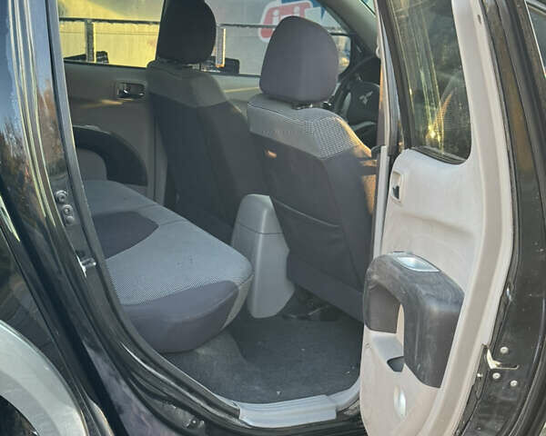 Чорний Міцубісі Л 200, об'ємом двигуна 2.5 л та пробігом 302 тис. км за 10500 $, фото 2 на Automoto.ua