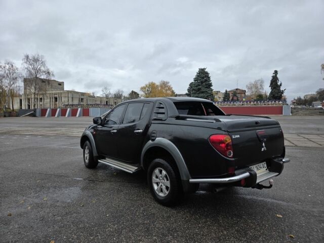 Чорний Міцубісі Л 200, об'ємом двигуна 2.5 л та пробігом 302 тис. км за 12500 $, фото 5 на Automoto.ua