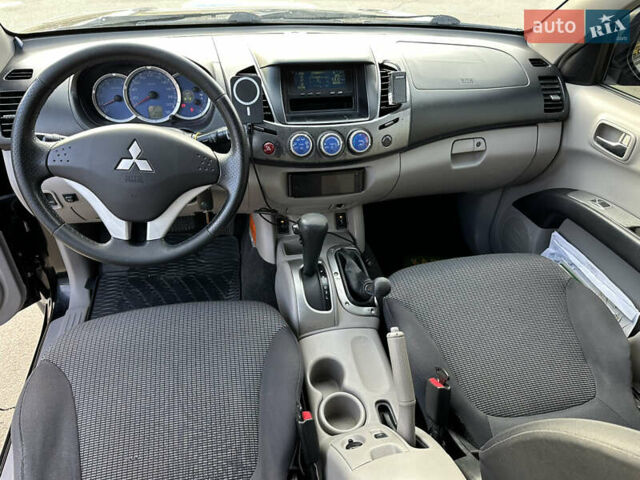 Чорний Міцубісі Л 200, об'ємом двигуна 2.48 л та пробігом 218 тис. км за 12999 $, фото 11 на Automoto.ua