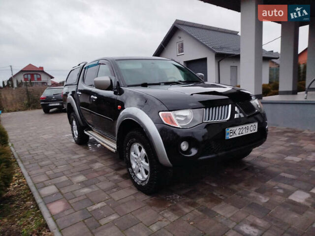 Чорний Міцубісі Л 200, об'ємом двигуна 2.48 л та пробігом 219 тис. км за 10500 $, фото 1 на Automoto.ua