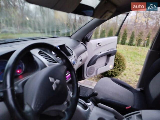 Чорний Міцубісі Л 200, об'ємом двигуна 2.48 л та пробігом 219 тис. км за 10500 $, фото 13 на Automoto.ua