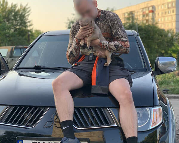 Черный Мицубиси Л 200, объемом двигателя 2.5 л и пробегом 221 тыс. км за 12800 $, фото 26 на Automoto.ua