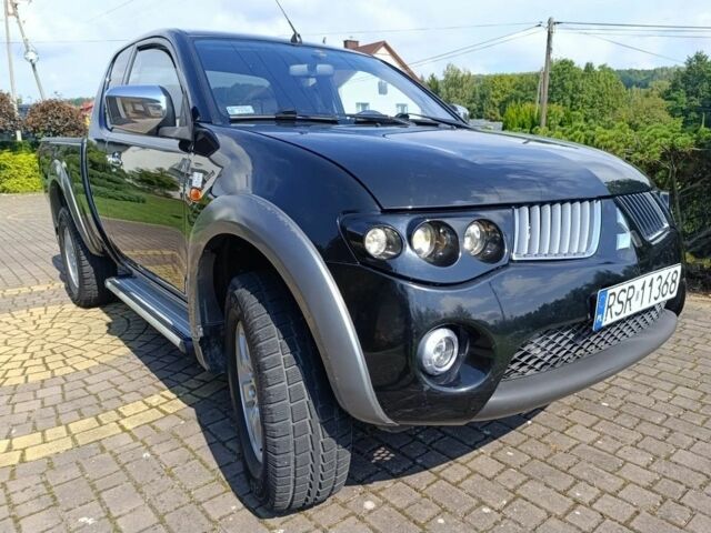 Черный Мицубиси Л 200, объемом двигателя 2.5 л и пробегом 230 тыс. км за 3150 $, фото 1 на Automoto.ua