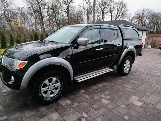 Чорний Міцубісі Л 200, об'ємом двигуна 2.5 л та пробігом 220 тис. км за 10500 $, фото 1 на Automoto.ua