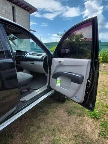 Черный Мицубиси Л 200, объемом двигателя 2.48 л и пробегом 392 тыс. км за 15500 $, фото 30 на Automoto.ua