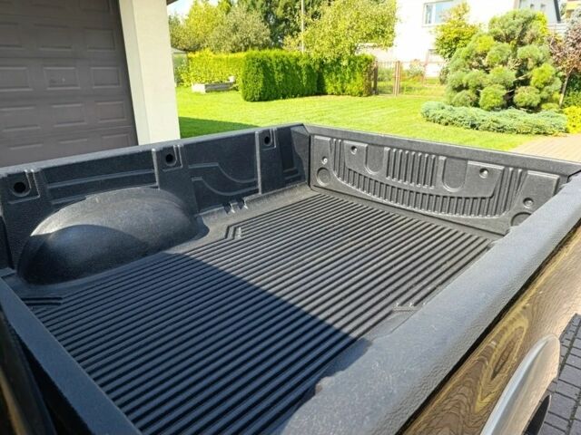 Черный Мицубиси Л 200, объемом двигателя 2.5 л и пробегом 230 тыс. км за 3150 $, фото 4 на Automoto.ua