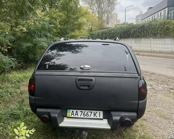 Чорний Міцубісі Л 200, об'ємом двигуна 2.48 л та пробігом 260 тис. км за 11500 $, фото 4 на Automoto.ua