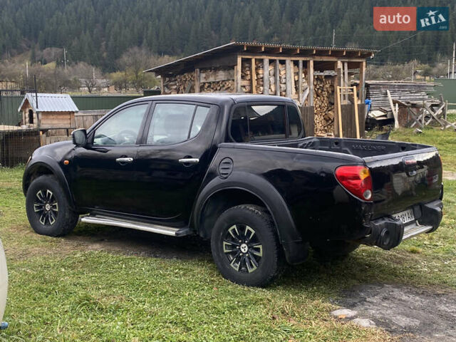 Черный Мицубиси Л 200, объемом двигателя 0 л и пробегом 409 тыс. км за 9500 $, фото 5 на Automoto.ua