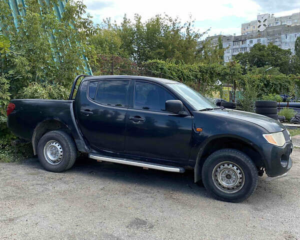 Чорний Міцубісі Л 200, об'ємом двигуна 2.48 л та пробігом 300 тис. км за 5000 $, фото 2 на Automoto.ua