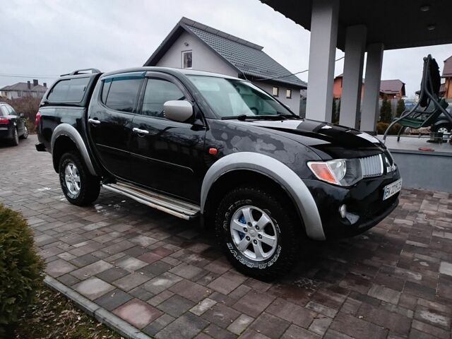 Чорний Міцубісі Л 200, об'ємом двигуна 2.5 л та пробігом 220 тис. км за 10500 $, фото 2 на Automoto.ua