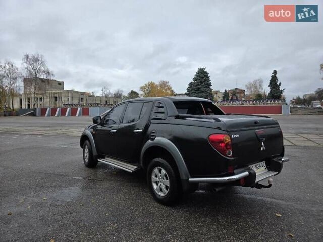 Чорний Міцубісі Л 200, об'ємом двигуна 2.48 л та пробігом 302 тис. км за 12500 $, фото 6 на Automoto.ua