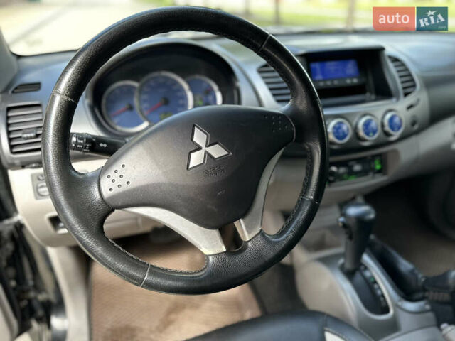 Чорний Міцубісі Л 200, об'ємом двигуна 2.48 л та пробігом 339 тис. км за 13999 $, фото 30 на Automoto.ua