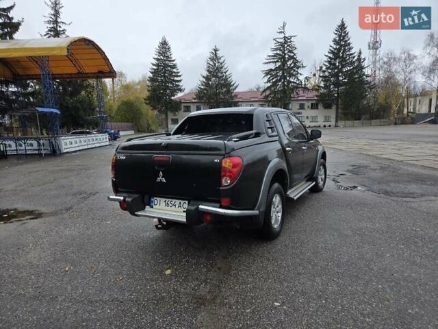 Чорний Міцубісі Л 200, об'ємом двигуна 2.48 л та пробігом 302 тис. км за 12500 $, фото 2 на Automoto.ua