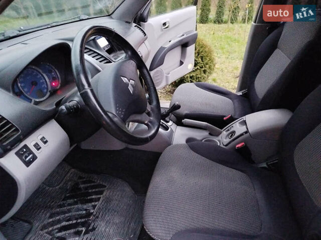Чорний Міцубісі Л 200, об'ємом двигуна 2.48 л та пробігом 219 тис. км за 10500 $, фото 14 на Automoto.ua