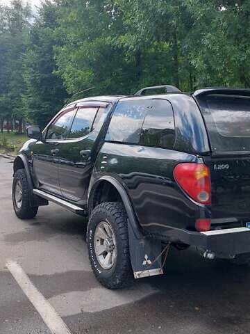 Черный Мицубиси Л 200, объемом двигателя 2.48 л и пробегом 392 тыс. км за 15500 $, фото 25 на Automoto.ua