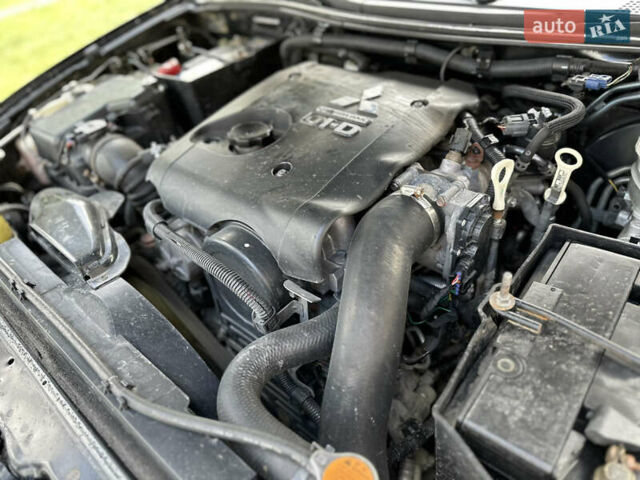 Чорний Міцубісі Л 200, об'ємом двигуна 2.48 л та пробігом 339 тис. км за 13999 $, фото 37 на Automoto.ua