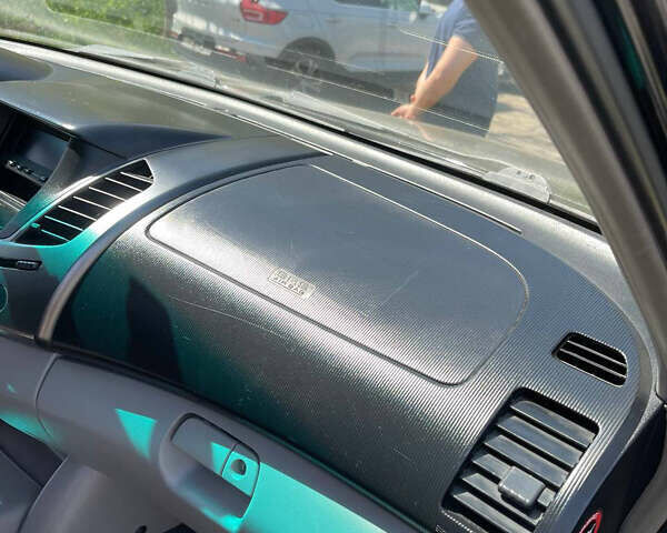 Черный Мицубиси Л 200, объемом двигателя 2.5 л и пробегом 221 тыс. км за 12800 $, фото 22 на Automoto.ua