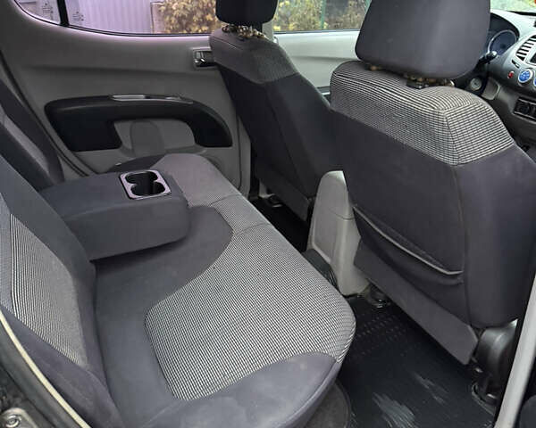 Черный Мицубиси Л 200, объемом двигателя 2.5 л и пробегом 261 тыс. км за 12300 $, фото 17 на Automoto.ua