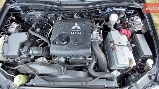 Черный Мицубиси Л 200, объемом двигателя 2.48 л и пробегом 392 тыс. км за 15500 $, фото 10 на Automoto.ua