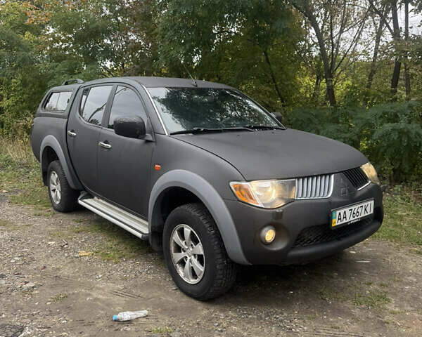 Чорний Міцубісі Л 200, об'ємом двигуна 2.48 л та пробігом 260 тис. км за 11500 $, фото 1 на Automoto.ua