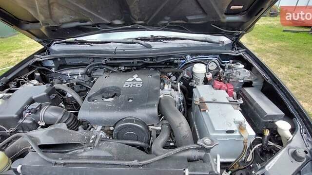 Черный Мицубиси Л 200, объемом двигателя 2.48 л и пробегом 392 тыс. км за 15500 $, фото 16 на Automoto.ua