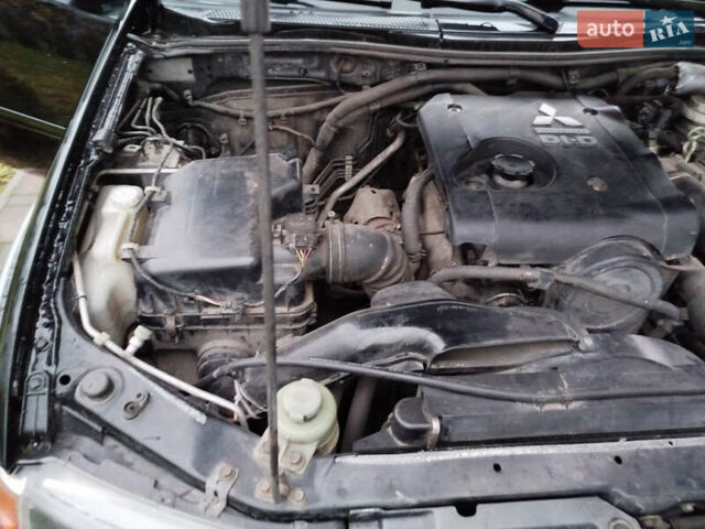 Чорний Міцубісі Л 200, об'ємом двигуна 2.48 л та пробігом 219 тис. км за 10500 $, фото 34 на Automoto.ua