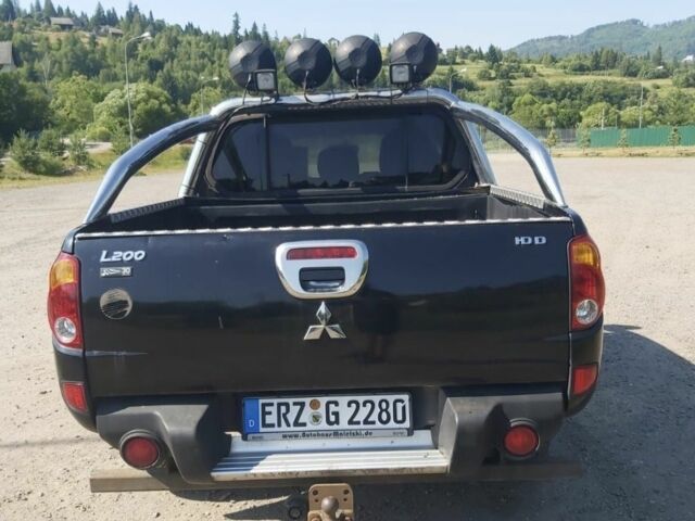 Чорний Міцубісі Л 200, об'ємом двигуна 2.5 л та пробігом 200 тис. км за 8756 $, фото 2 на Automoto.ua