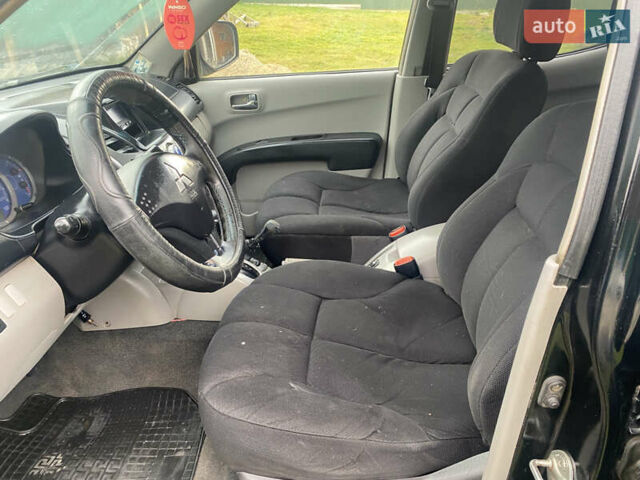 Черный Мицубиси Л 200, объемом двигателя 0 л и пробегом 409 тыс. км за 9500 $, фото 7 на Automoto.ua